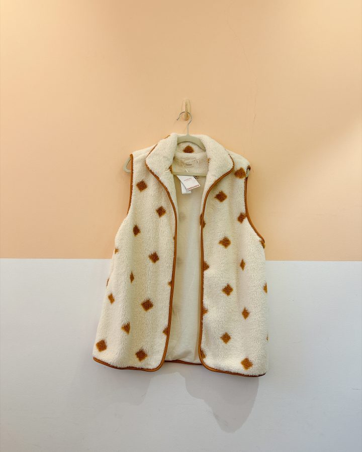 Colete teddy estampado A. Niemeyer para Riachuelo M